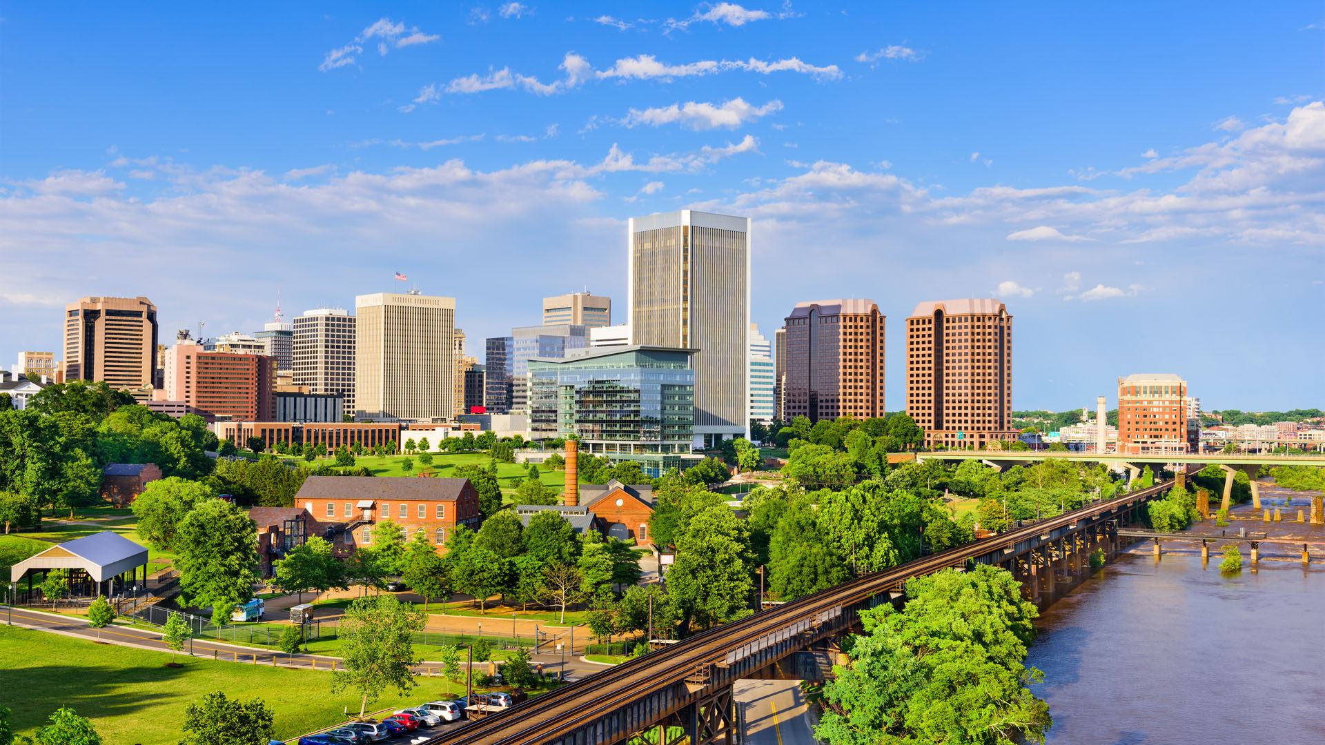 Richmond, Virginia, USA downtown skyline on the James River. Home Hero